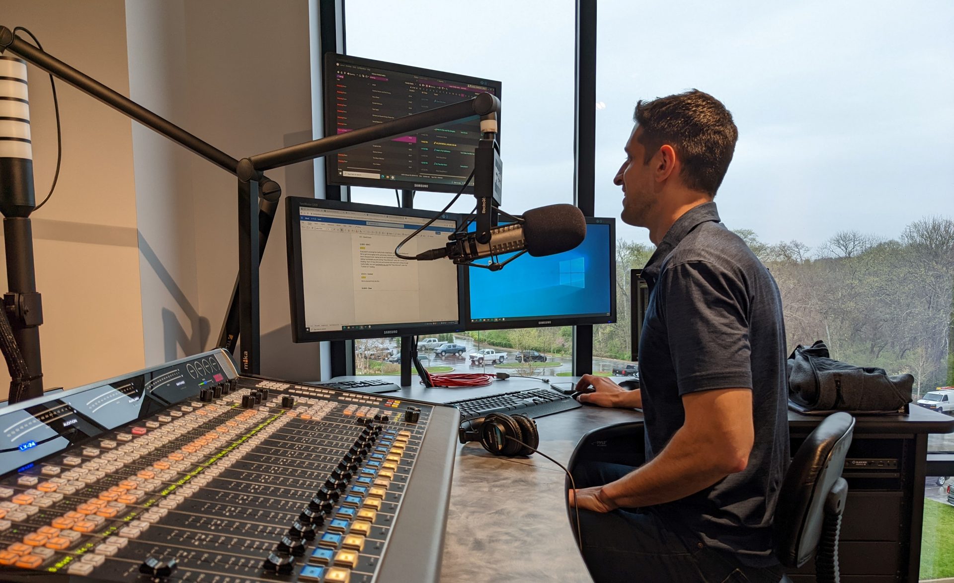 Jason Frentsos at the mic in the Family Radio Studio. 